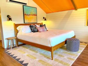 a bedroom with a bed in a room at Beautiful Tented Cabin in Texas for Glamping by Guadalupe River in Hunt +26 photos