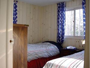 Ένα ή περισσότερα κρεβάτια σε δωμάτιο στο Secluded Family Mountain Rental with Fireplace in Windham, New York