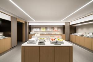 Η κουζίνα ή μικρή κουζίνα στο JI Hotel Guangzhou Taojin Subway Station