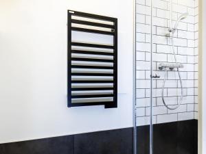 a bathroom with a shower and a mirror at Ibis Pau Centre in Pau +59 photos