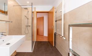 Koupelna v ubytování Bernsteinbad-Koserow-Komfortable-Ferienwohnung-Vineta + 12 fotografií