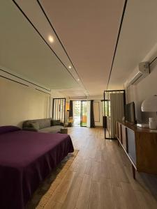 Postel nebo postele na pokoji v ubytování Nogalera Collection Apartments