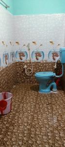 Koupelna v ubytování Sri Sai rooms