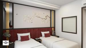 Ένα ή περισσότερα κρεβάτια σε δωμάτιο στο Sky Charm Hanoi Hotel and Spa +94 φωτογραφίες