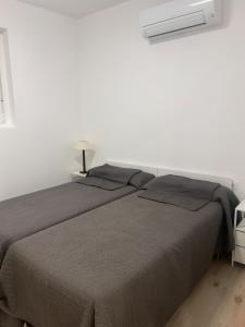 Postel nebo postele na pokoji v ubytování Cal Sereno