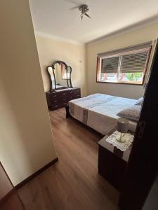 Ένα ή περισσότερα κρεβάτια σε δωμάτιο στο Paradise Property,Ideal para ferias ou Lua de Mel +67 φωτογραφίες