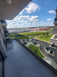 a balcony with a view of a highway at Keri Luxury Apartments in Oradea