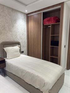 Una cama o camas en una habitación de Dar Sunset Anza