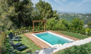 Bazén v ubytování Villa avec piscine Saint-Paul-de-Vence 9P nebo v jeho okolí