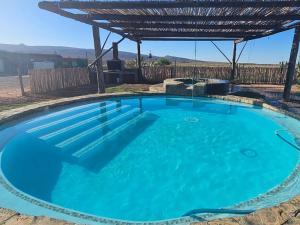 Πισίνα στο ή κοντά στο Rooidakkies