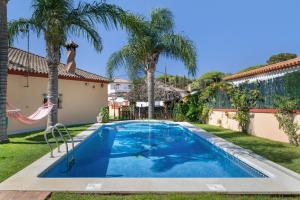 Bazén v ubytování Casa La Muela nebo v jeho okolí