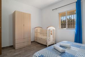 Postel nebo postele na pokoji v ubytování Casa La Muela + 20 fotografií