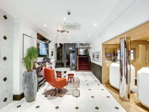 Posezení v ubytování Mercure Paris Opera Louvre