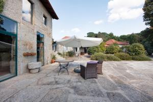 Et opholdsområde på Casa de Andrães Loft Heras