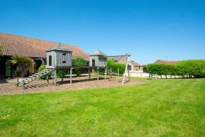 a park with a playground with a slide at The Antingham in Roughton