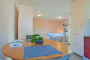 Postel nebo postele na pokoji v ubytování Terrassen-Apartment in Bamberg