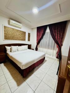 Afbeelding uit fotogalerij van Hôtel du Boulevard in Brazzaville