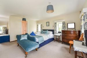 Giường trong phòng chung tại Aura Favoni, West Wittering