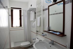 Koupelna v ubytování Hotel Il Ghiro