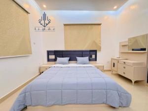 Katil atau katil-katil dalam bilik di AGHARINA appartment