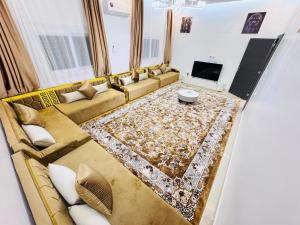 Ruang duduk di AGHARINA appartment