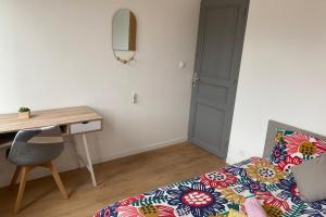 Ένα ή περισσότερα κρεβάτια σε δωμάτιο στο Zenith Urbain