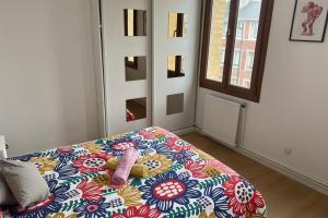 Ένα ή περισσότερα κρεβάτια σε δωμάτιο στο Zenith Urbain +9 φωτογραφίες