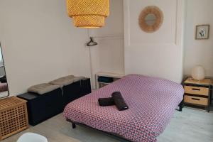 Ένα ή περισσότερα κρεβάτια σε δωμάτιο στο Le Sainte Marie