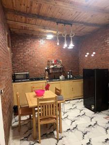 Kuchyň nebo kuchyňský kout v ubytování Djorff studio + 3 fotografie