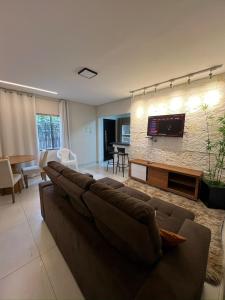 Χώρος καθιστικού στο Casa aconchegante 2min do centro