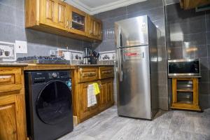 Kuchyň nebo kuchyňský kout v ubytování Glorylife Chalet + 8 fotografií
