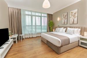 Ένα ή περισσότερα κρεβάτια σε δωμάτιο στο Sokon Residence Maadi