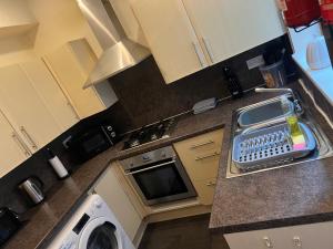 an overhead view of a kitchen with a typewriter on a counter at 54 - Room 1 - City views in Swansea