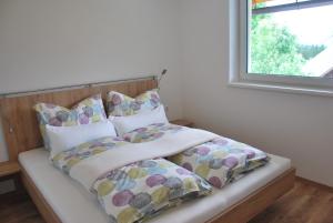 Un pat sau paturi într-o cameră la Haus Pflaum