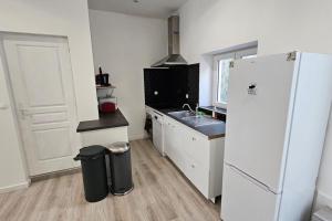 Kuchyň nebo kuchyňský kout v ubytování Maison de ville Le Havre