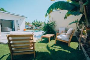 Κήπος έξω από το Le refuge balinais