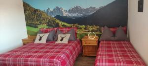 Ένα ή περισσότερα κρεβάτια σε δωμάτιο στο Apartments Giovannini