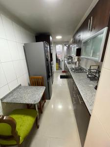 Kuchyň nebo kuchyňský kout v ubytování Residential apartment in Ñuñoa