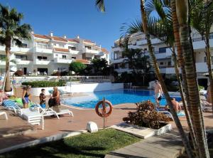 Πισίνα στο ή κοντά στο Appartamento May Flowers Playa de Los Cristianos