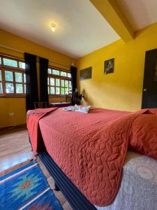 Postel nebo postele na pokoji v ubytování Casita del Sol