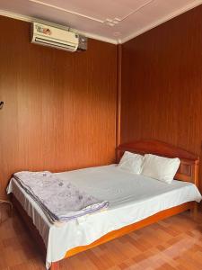 Ένα ή περισσότερα κρεβάτια σε δωμάτιο στο Hà Giang Eco Bungalow