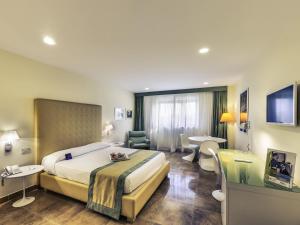 Katil atau katil-katil dalam bilik di Mercure Villa Romanazzi Carducci Bari