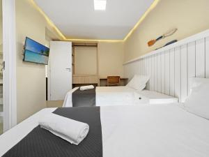 Postel nebo postele na pokoji v ubytování Piscina - 4 Suítes - Condominio Clube - Marina