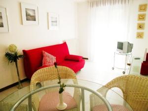 A television and/or entertainment centre at Lina's Apartment