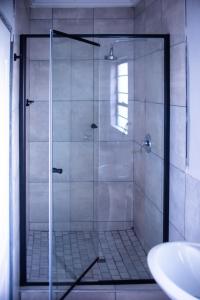 Ένα μπάνιο στο Lugogo Guesthouse