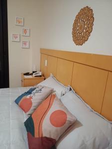 Ένα ή περισσότερα κρεβάτια σε δωμάτιο στο Piemonte Flat Apart Serra Negra