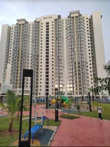 a large apartment building with a playground in front of it at D'bey Melaka Homestay in Bukit Baru +29 photos