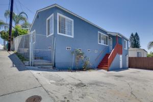 a blue house with a staircase in front of it at 4 Mi to Dtwn San Diego Cozy Getaway with Patio! in San Diego