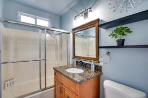 a bathroom with a sink and a shower at 4 Mi to Dtwn San Diego Cozy Getaway with Patio! in San Diego +20 photos
