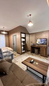 Posezení v ubytování Masalli Hotel Isti su
